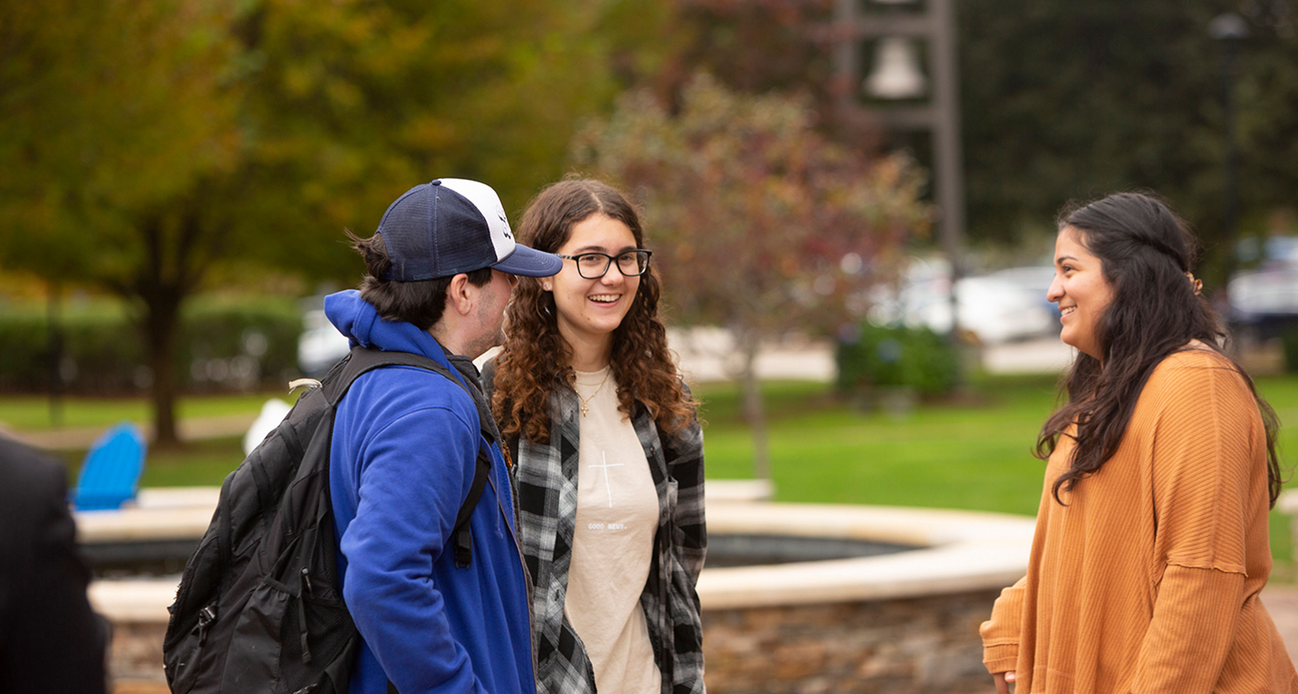 Assumption students talking in a circle