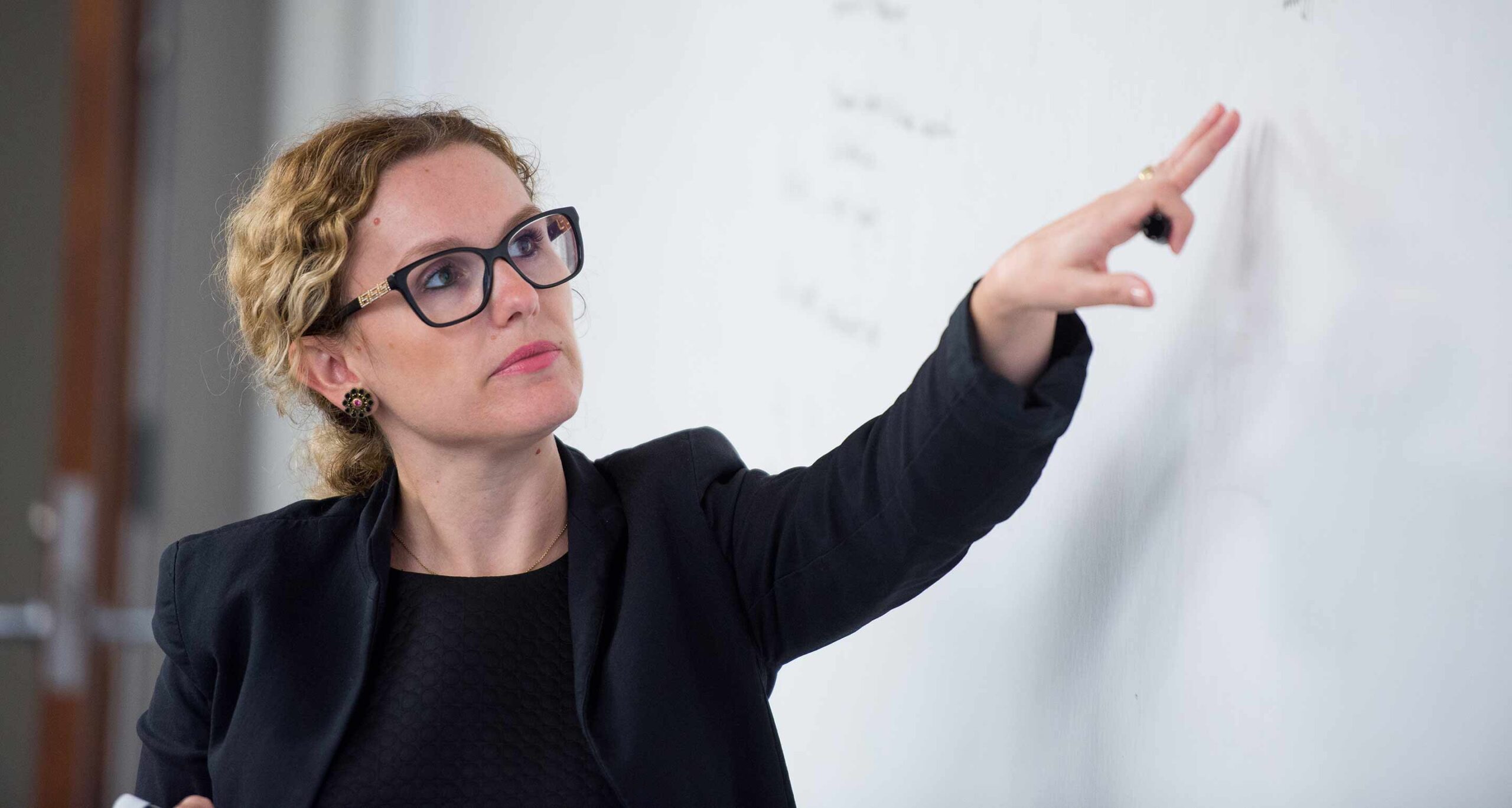 professor working on whiteboard