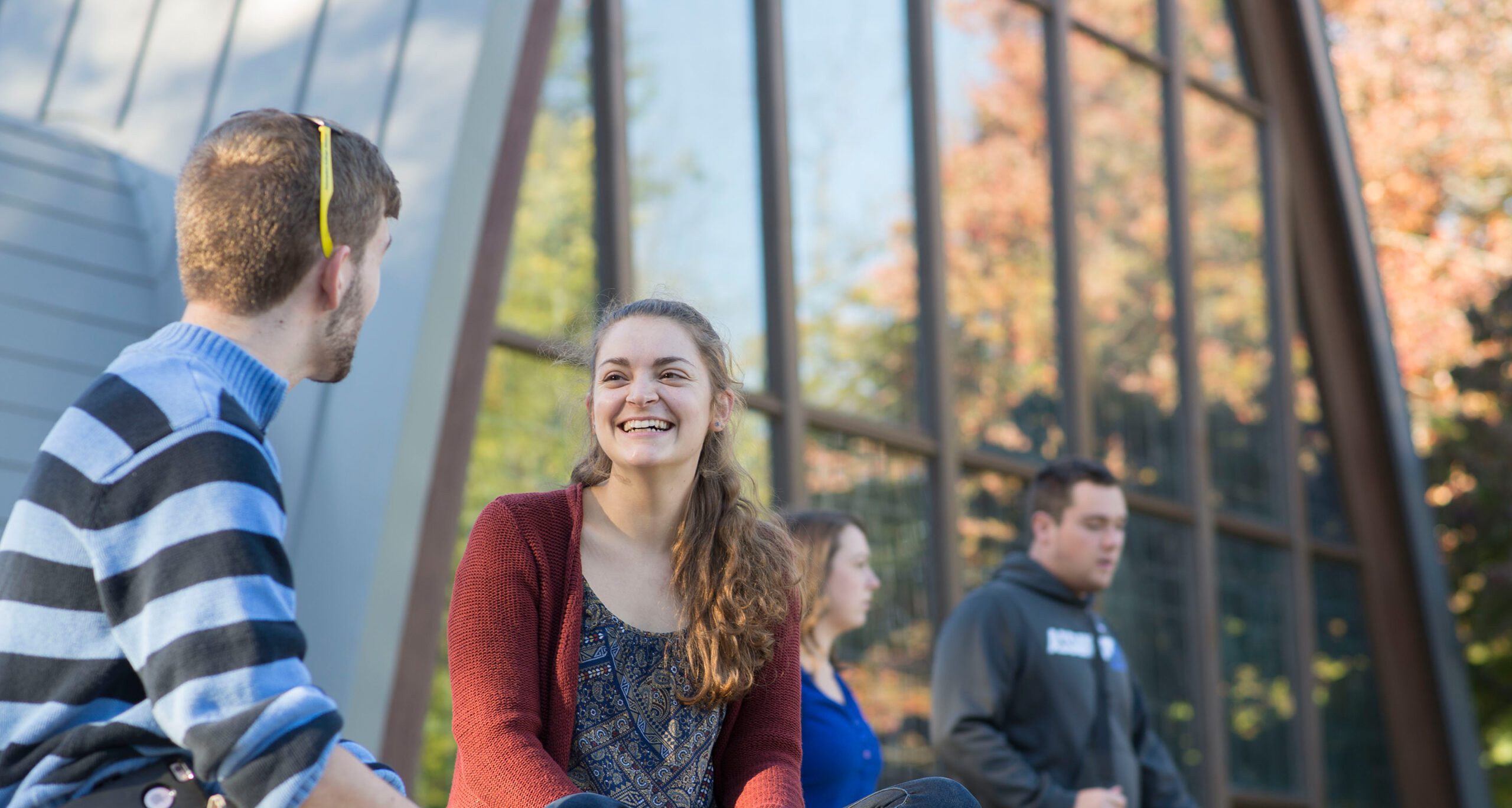 Assumption students outside of the Chapel of the Holy Spirit on campus.