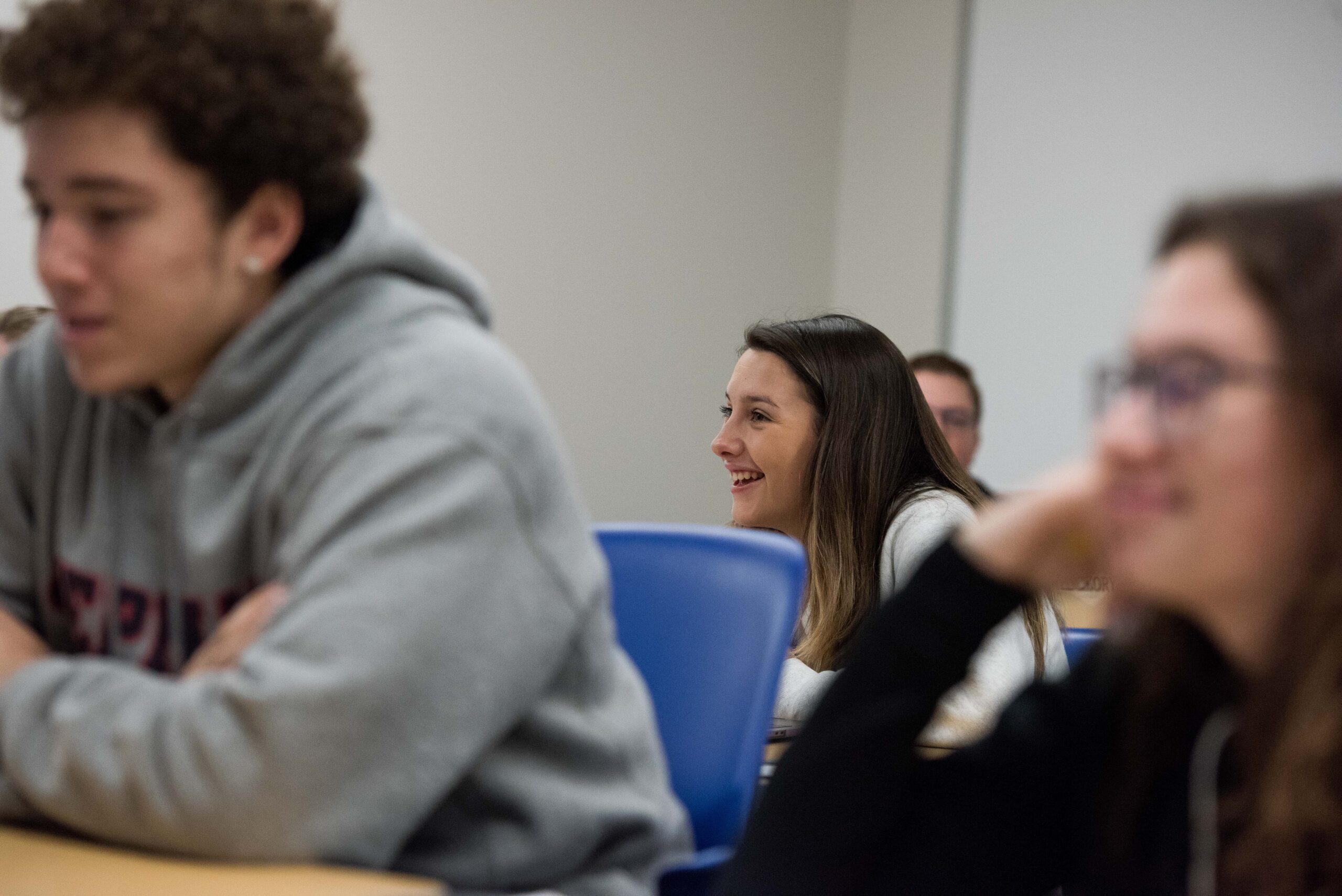 An Assumption College student in class.