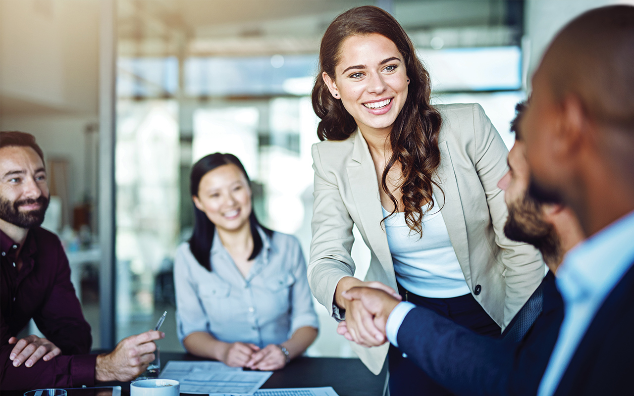 Photo of individuals engaging with one another. Individuals can apply to Assumption as a high school senior into the dual degree program with one application and benefit from being considered for a $2,500 Assumption Business Leader Scholarship (per year for 5 years)