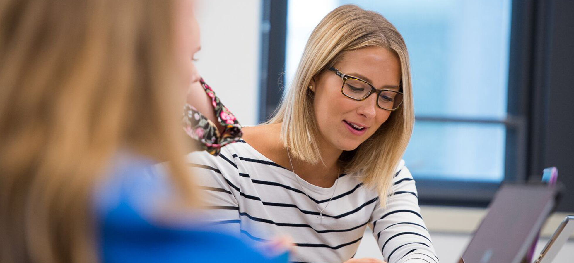 An Assumption clinical counseling psychology student studying in class.