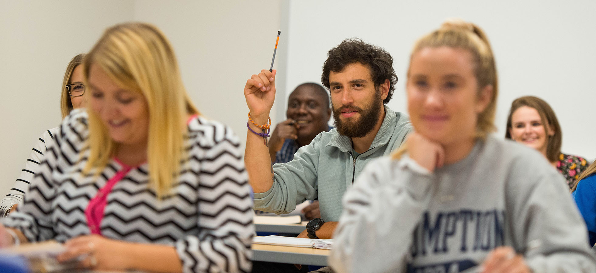 Students engaged in learning in an Assumption classroom. Assumption is hosting virtual information sessions during the COVID-19 situation to learn more about its exemplary academic programs such as Rehabilitation Counseling.