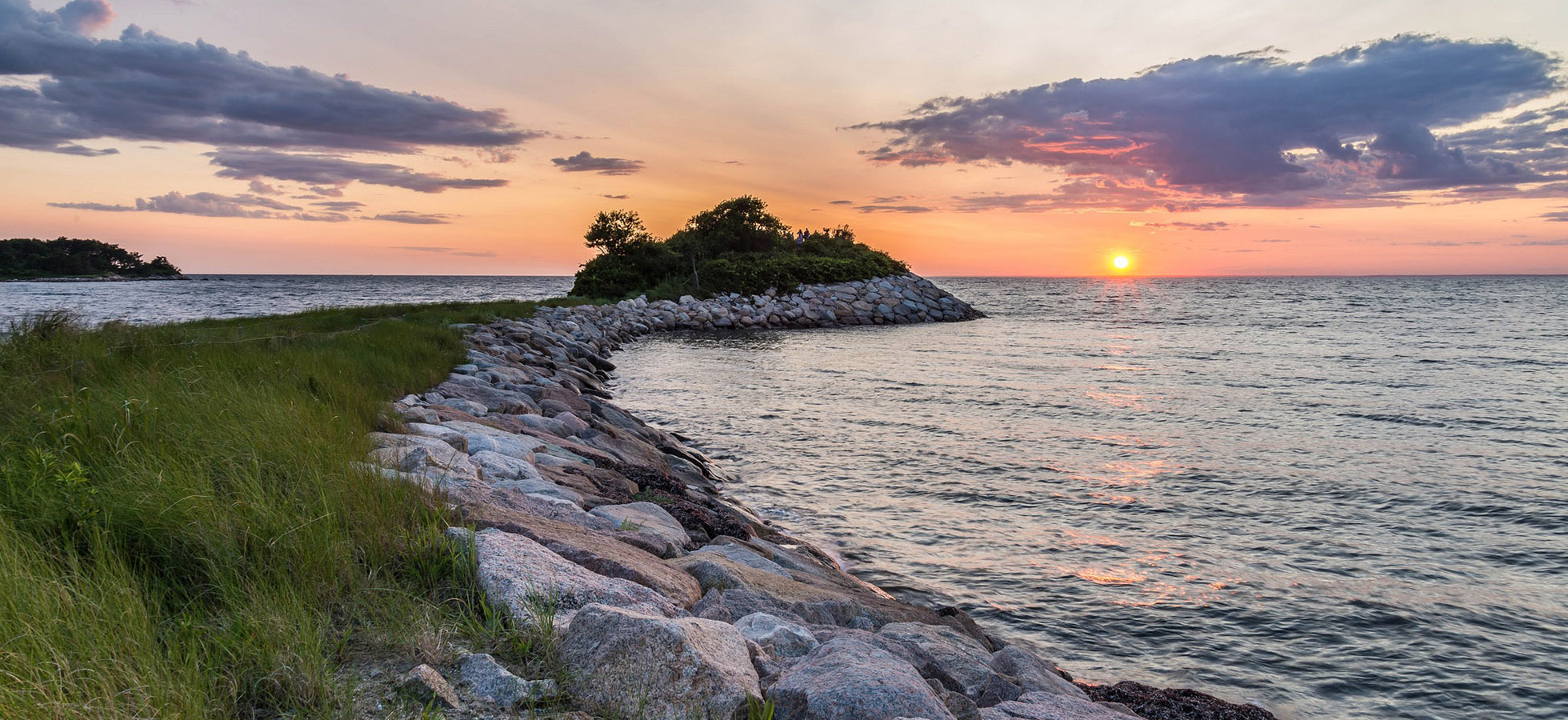 A Cape Cod sun set viewed from the shore.