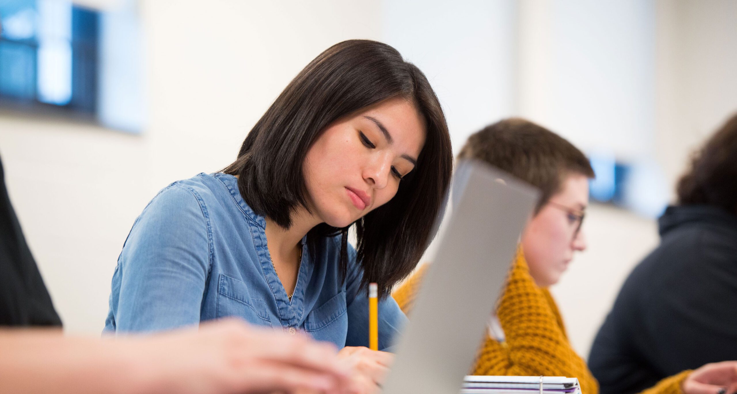 Female Student in Classroom