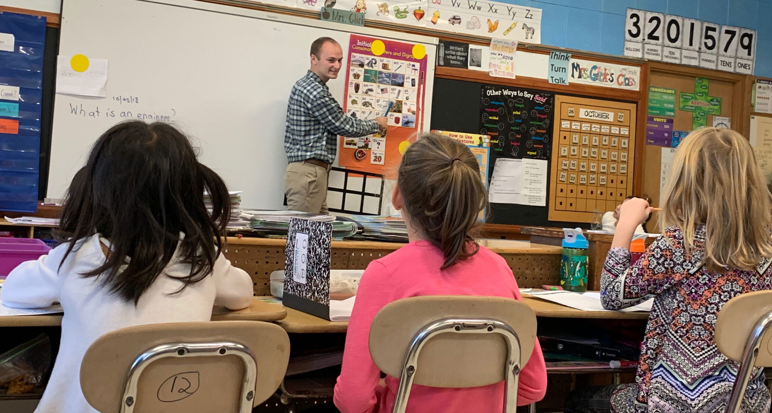 Elementary School Teacher with Students