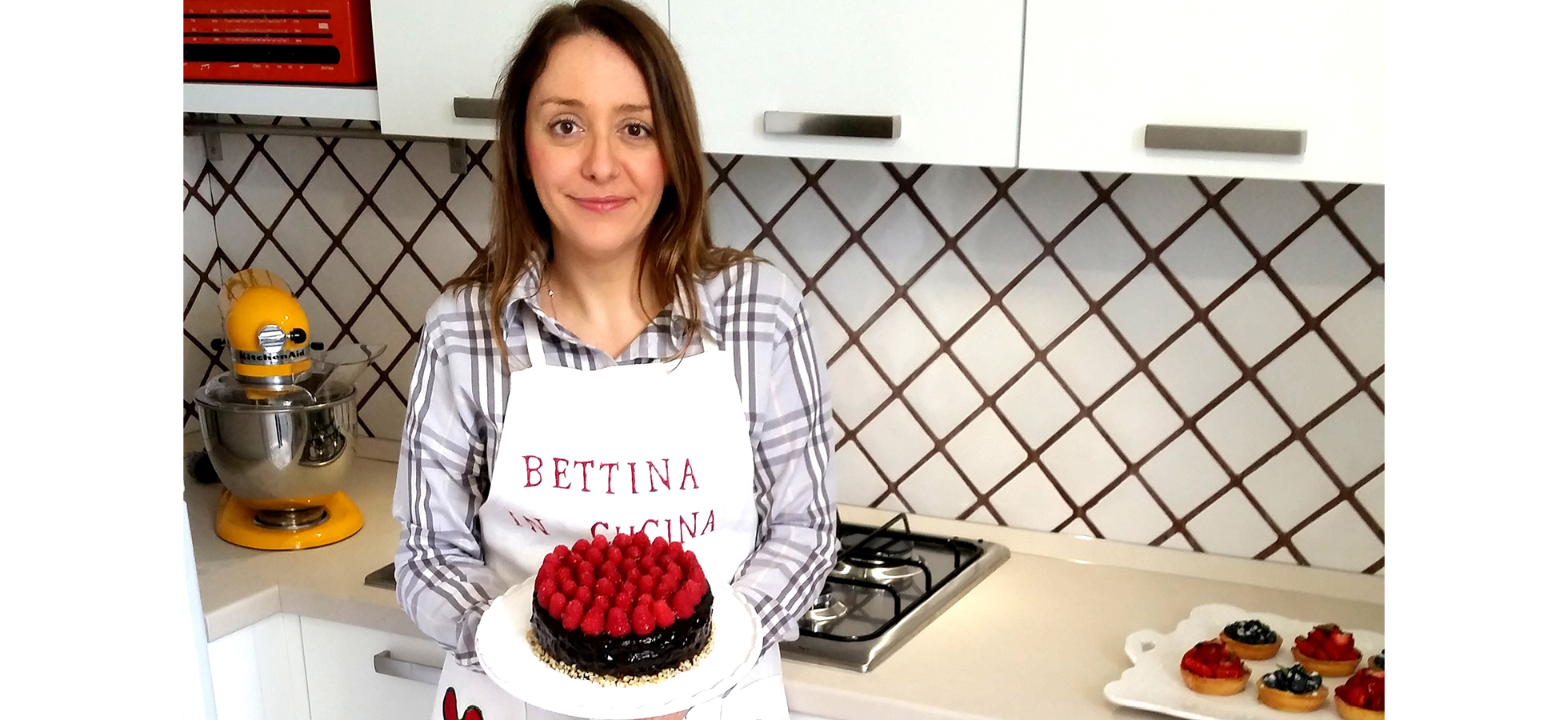 Photo of Bettina Balzani cooking in her kitchen in Italy.