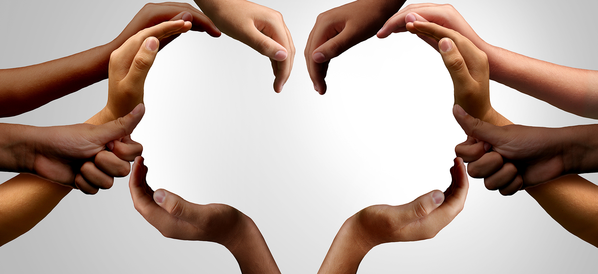 A collection of hands in the shape of a heart that is being used to promote I Am More, an exhibit on mental health at  Assumption University.