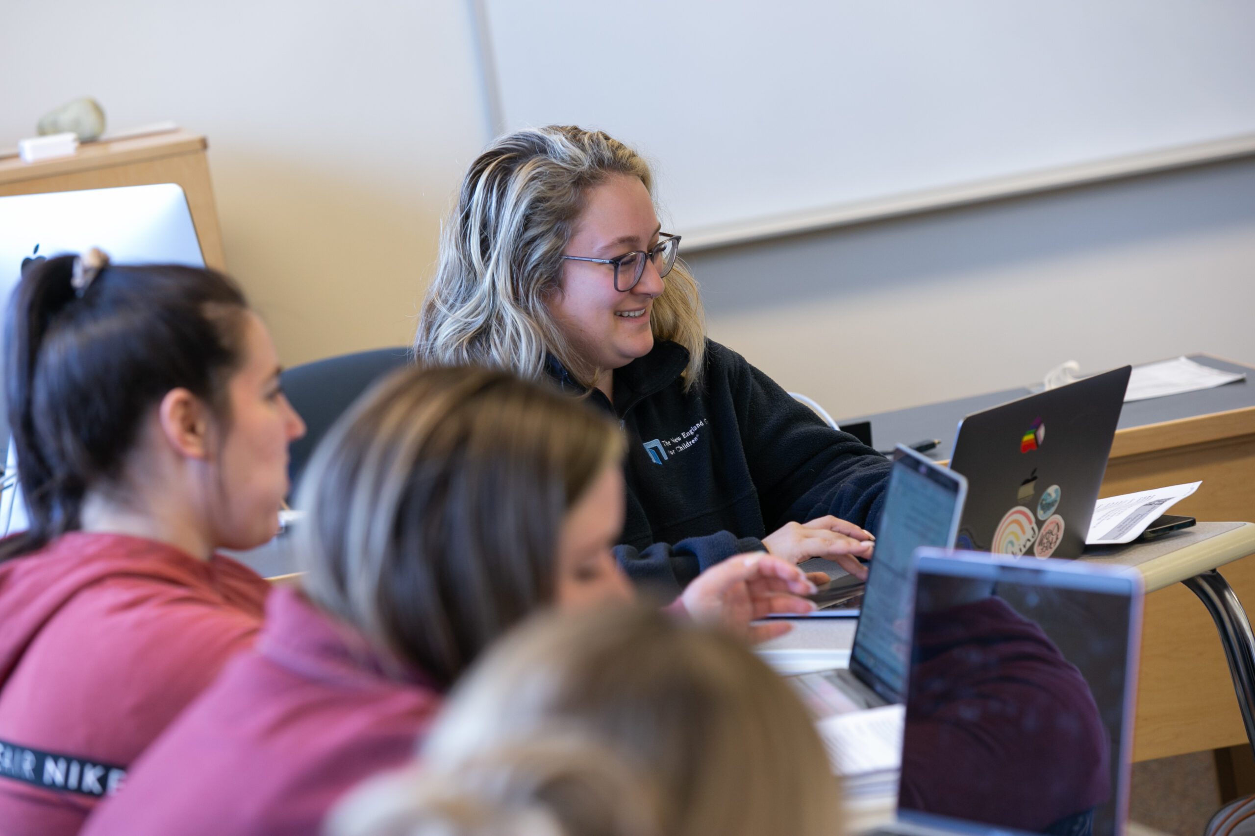 Graduate students at Assumption University study together.