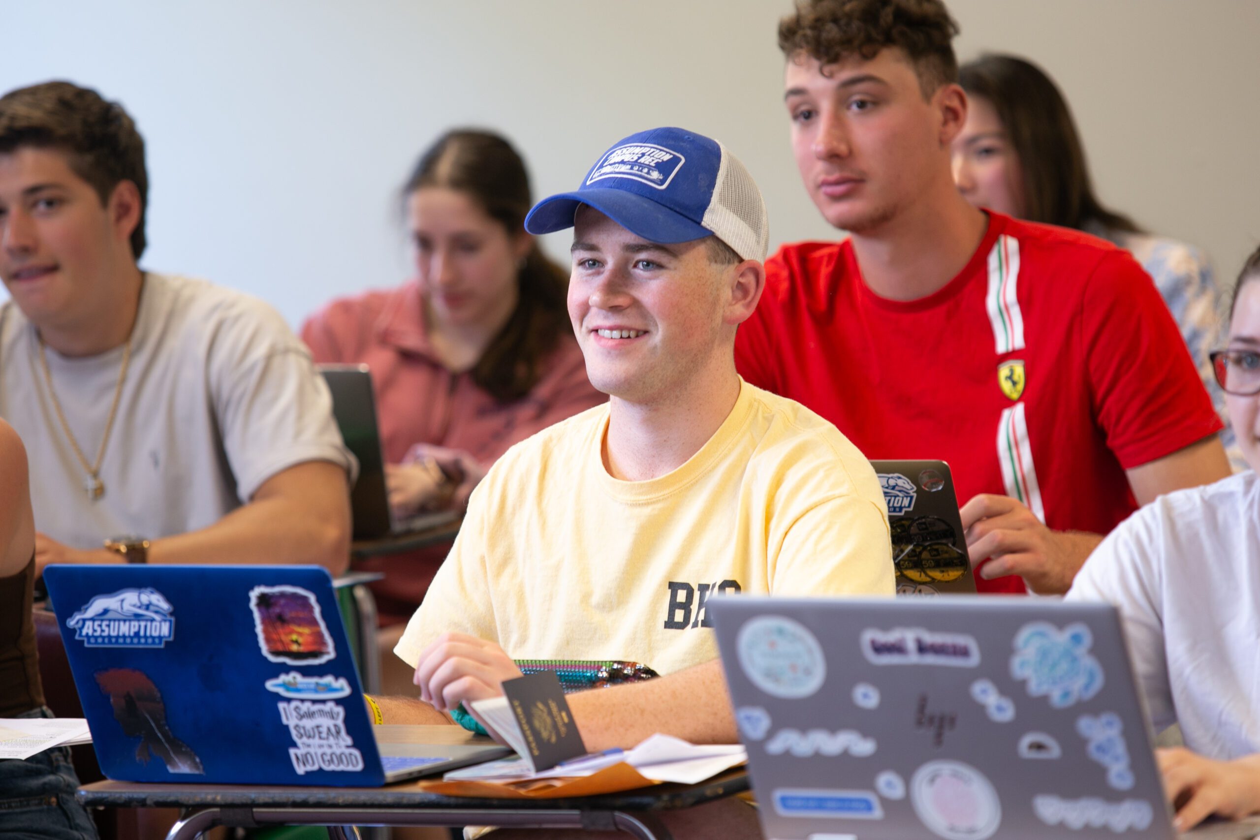 Assumption students sitting in a classroom.