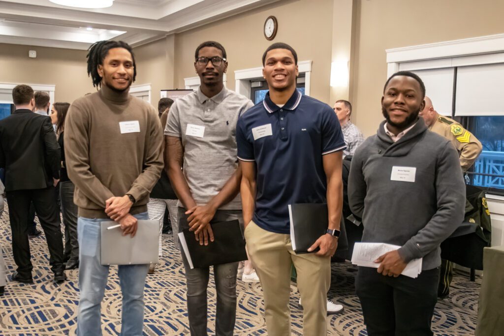 Male Assumption University students attend a Career Fair on campus.