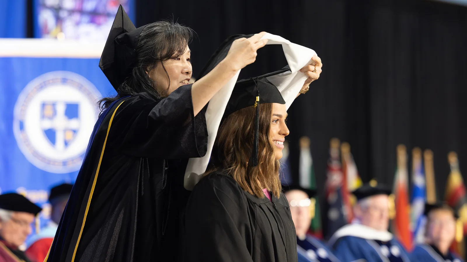 Student at a graduate commencement ceremony