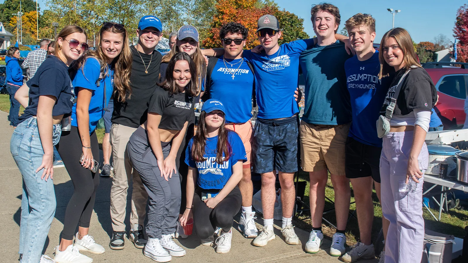 Assumption students at a tailgate before a football game